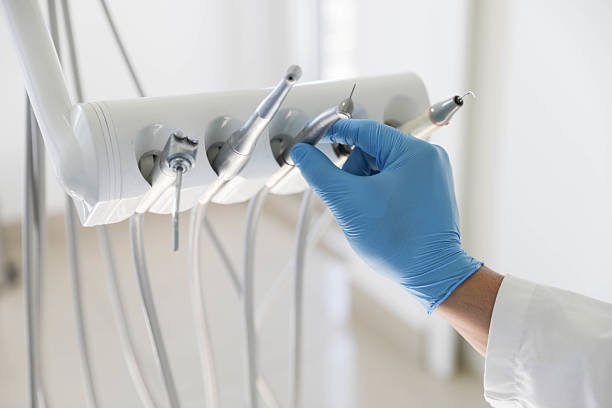 Professional Tooth Extraction technician working in Parkville, MO